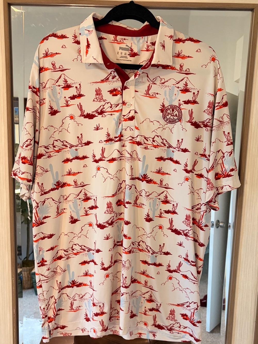 Puma MATTR Bushland polo shirt in a desert-themed print with PGA logo size XL